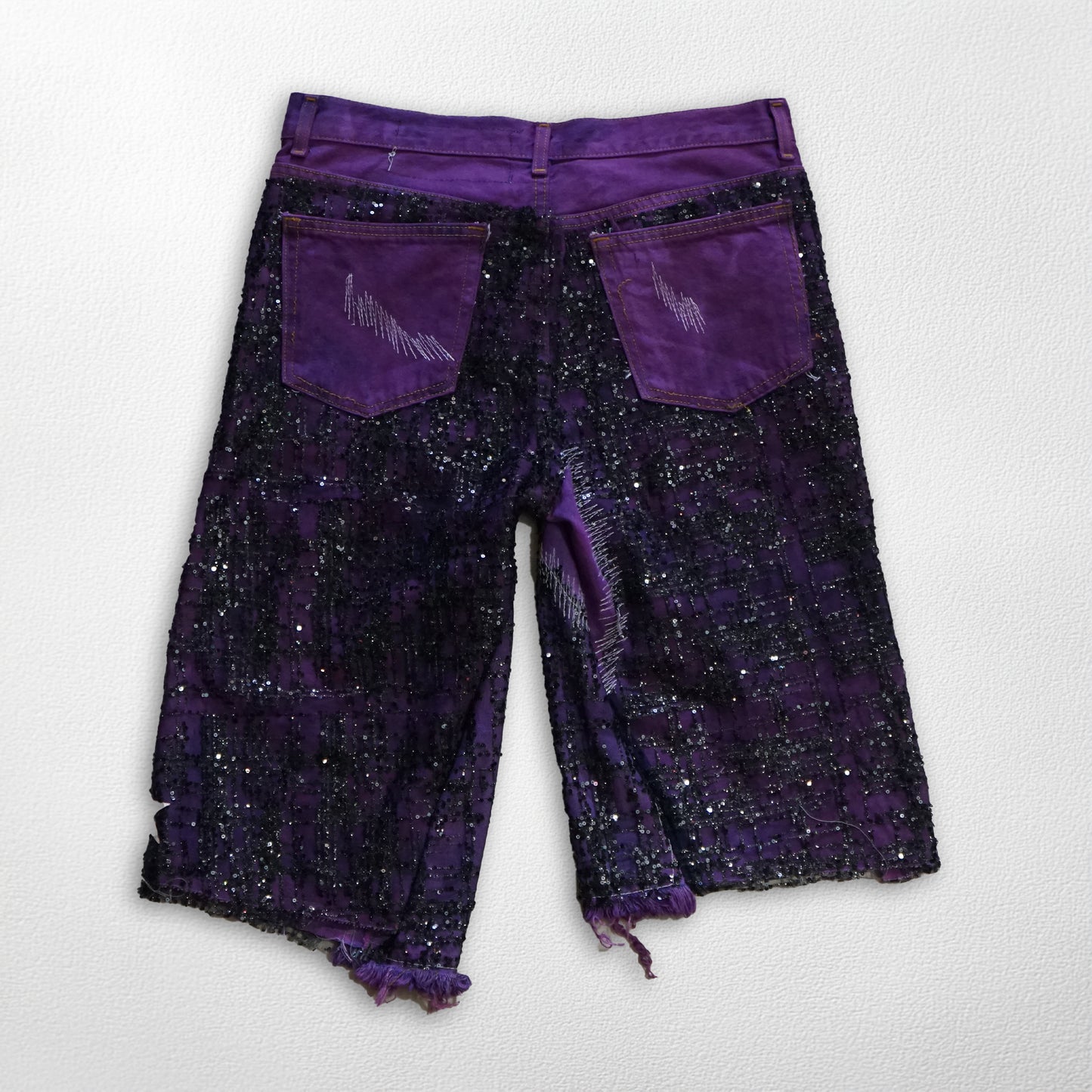 Stellar Spark: Purple & Black Glitter Leather Star Shorts